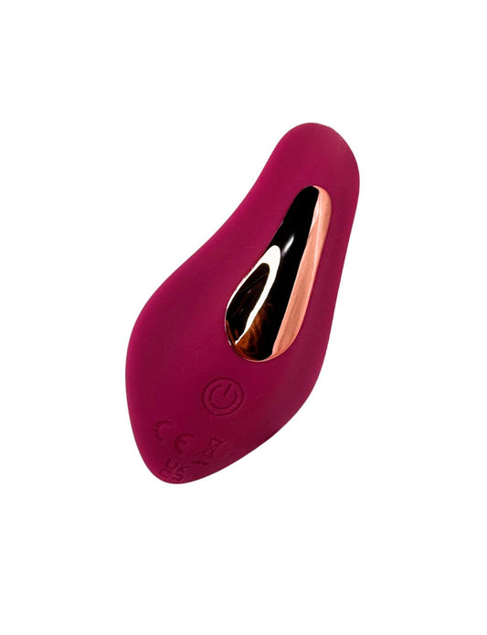 App-controlled wearable vibrator in pink designed for discreet stimulation.