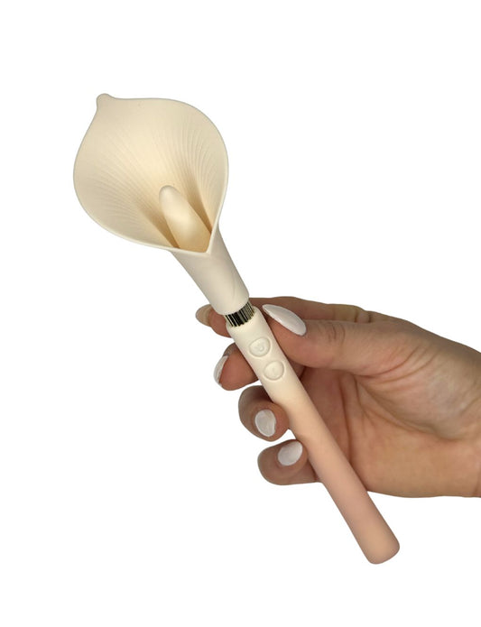 Elegant clitoral stimulator with sculptural floral design.