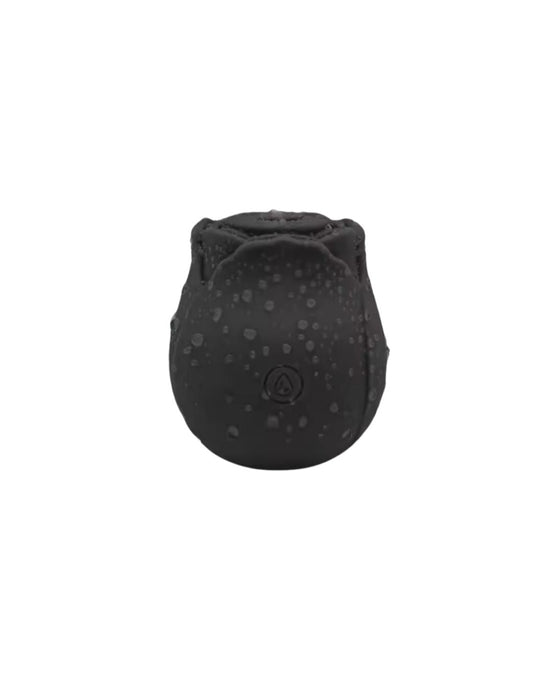 Black Rose Clitoral Sucking Vibrator Secret Kiss in soft pink silicone with a blooming rose design.