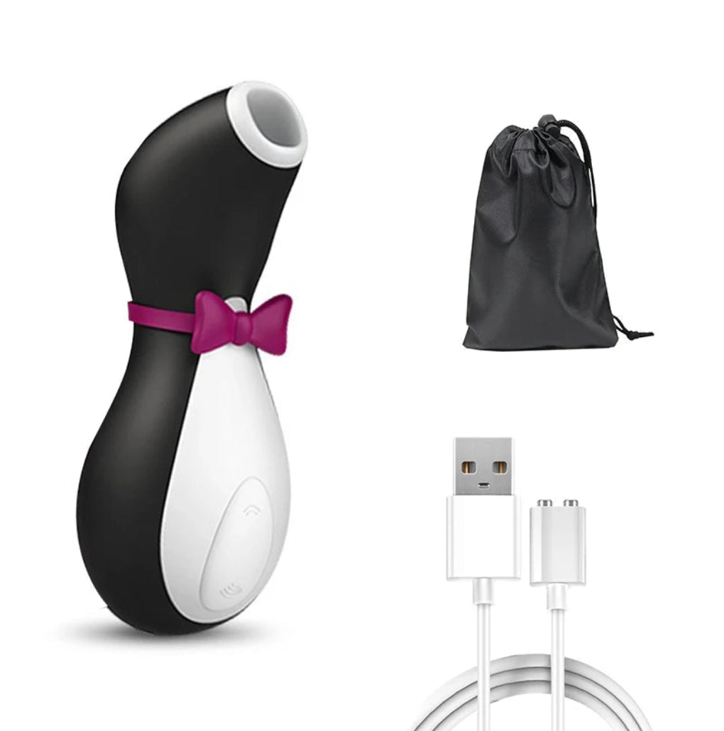 Penguin Secret Kiss clitoral vibrator with its discreet packaging and USB magnetic charger, ideal for gifting and convenient storage.