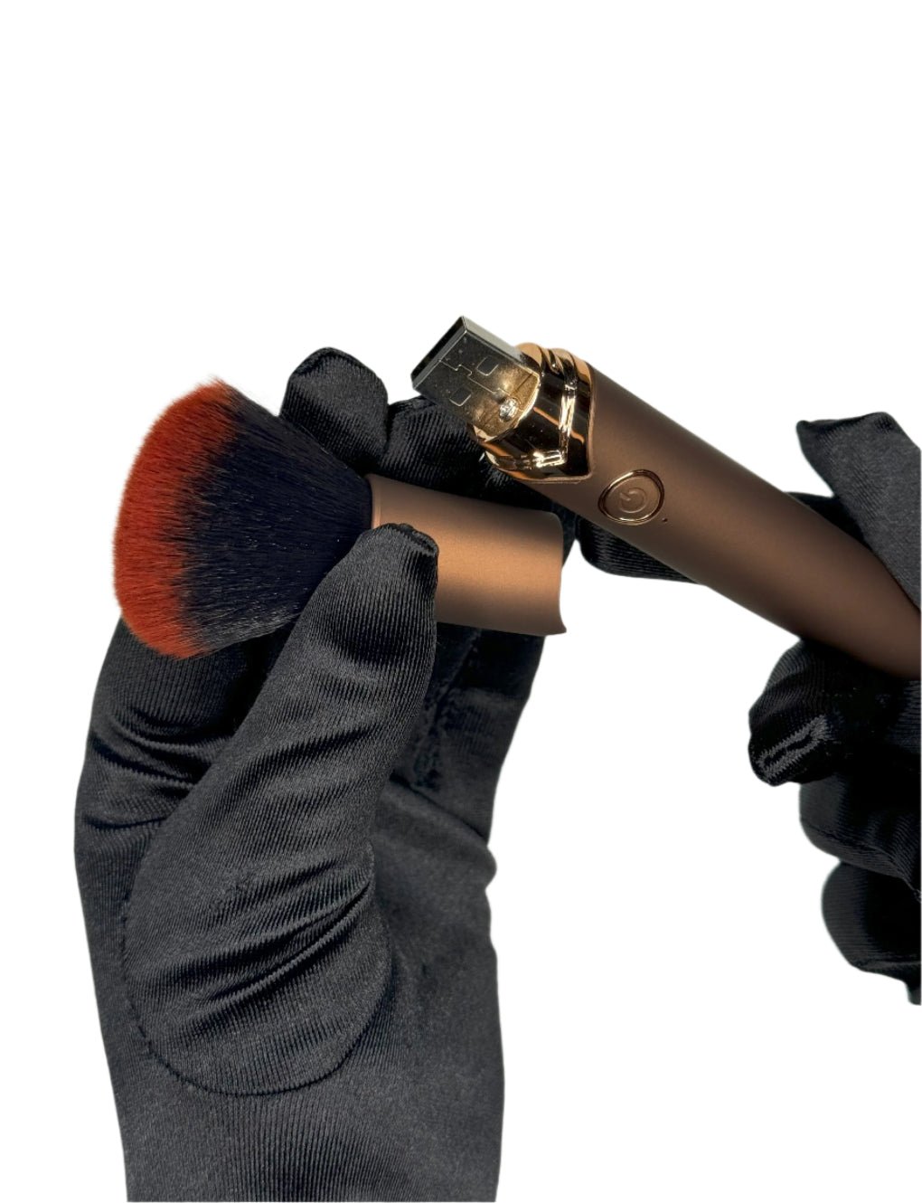 Compact and discreet – Electric Vibration Makeup Brush Secret Kiss held in hand, revealing its dual-purpose design.