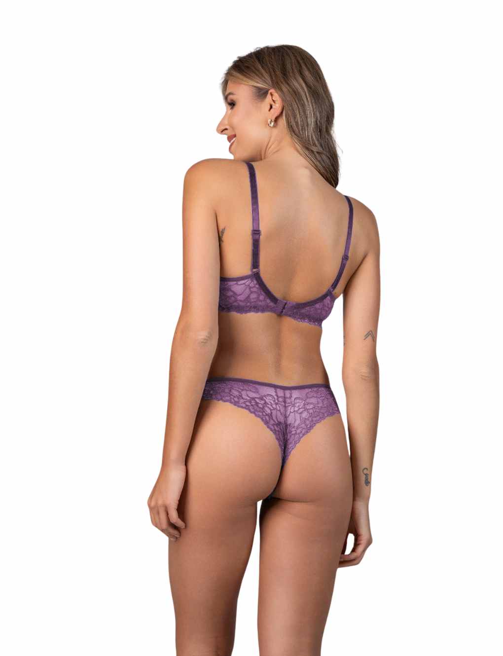 Female model showcasing a mauve lace lingerie set featuring a molded bra and matching thong, part of the Noir Collection by Secret Kiss.
