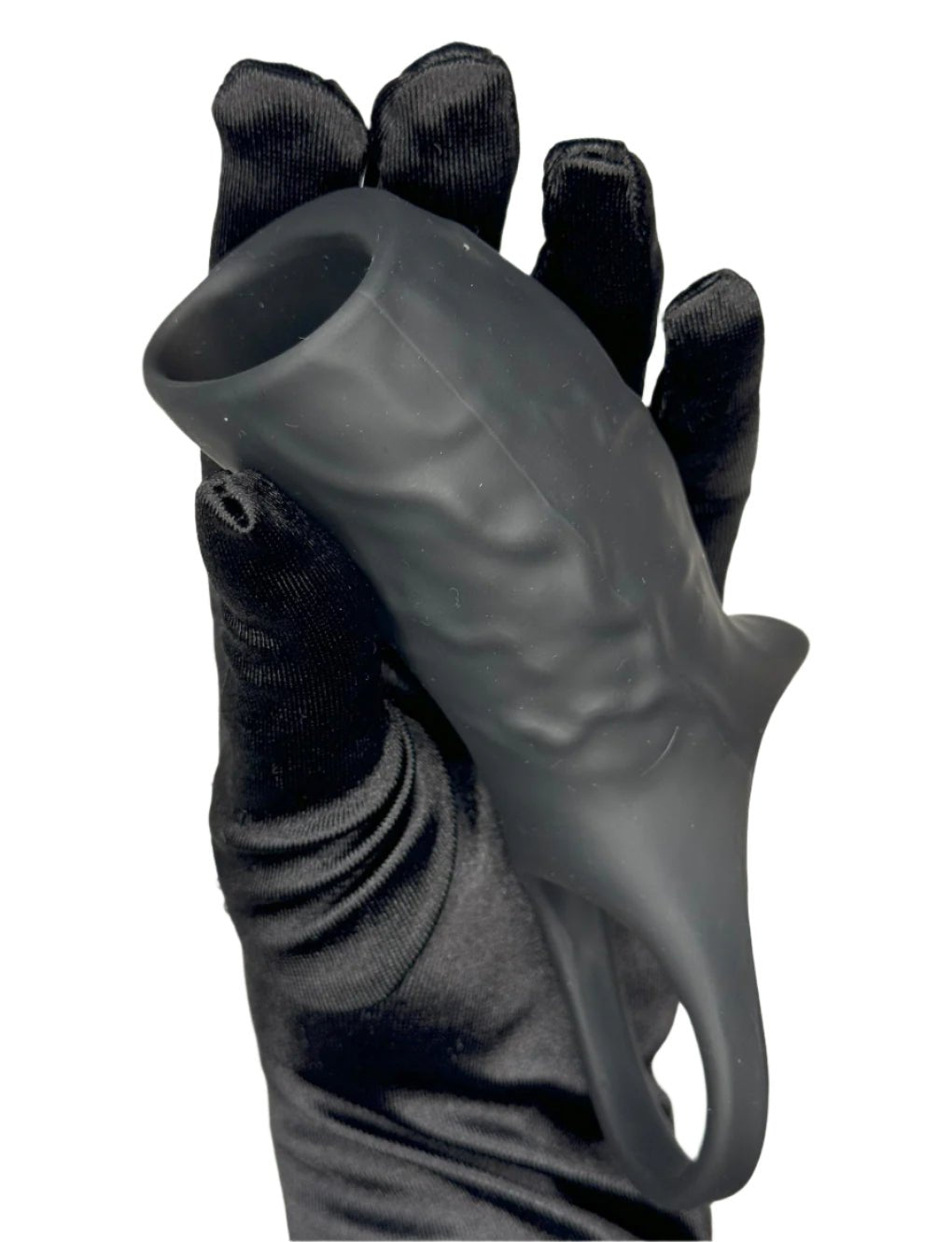 Hand holding the Vibrating Penis Sleeve & Cock Ring Secret Kiss, highlighting its flexibility and compact size.
